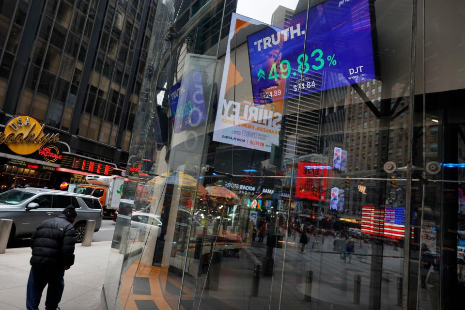 Trump Media & Technology Group stock market trading information is seen on a television at the Nasdaq Marketplace on March 26, 2024 in New York City.