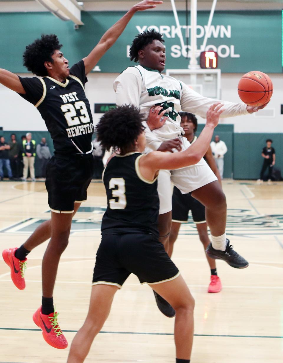 Woodlands Jamison Stevens (23) drives to the basket against West Hempstead during the state Class B regional final at Yorktown High School March 9, 2024.