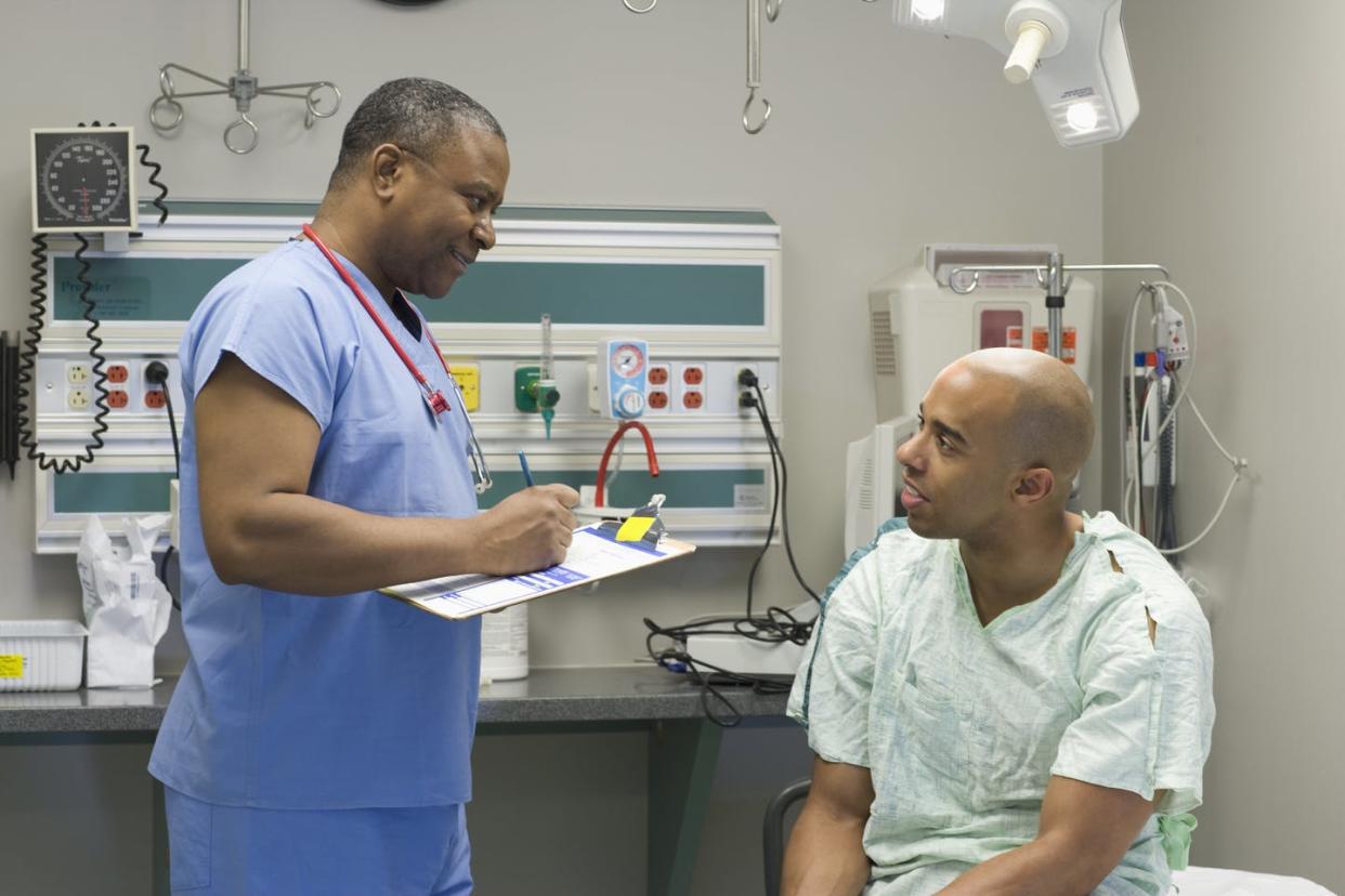 <span class="caption">Minority patients often have better rapport with a same-race or same-ethnicity doctor. </span> <span class="attribution"><a class="link " href="https://www.gettyimages.com/detail/photo/black-doctor-questioning-patient-in-hospital-royalty-free-image/103919463?adppopup=true" rel="nofollow noopener" target="_blank" data-ylk="slk:Getty Images / ER Productions Limited;elm:context_link;itc:0;sec:content-canvas">Getty Images / ER Productions Limited</a></span>