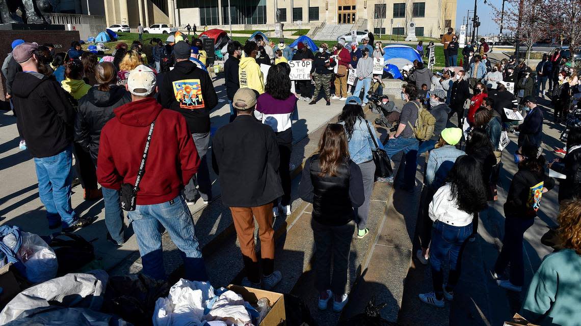 KC Homeless Union holds a rally Thursday, April 1, 2021, to protest what they say is a notice to vacate the grounds of City Hall. KC Tenants join them. More than 100 people attended.