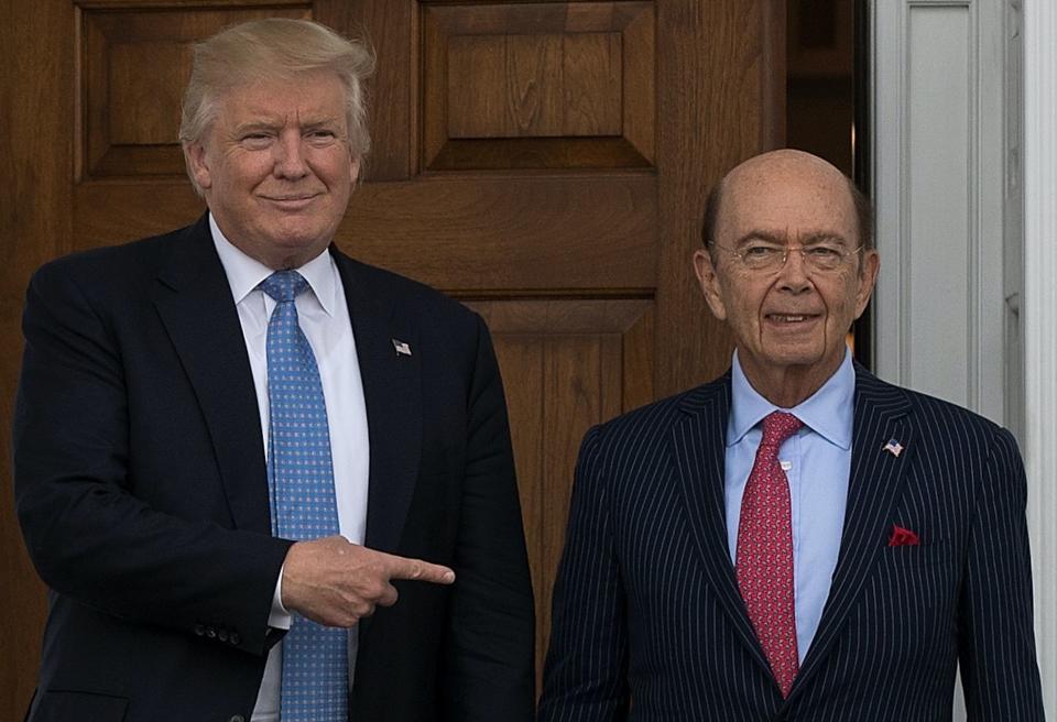 President-elect Donald Trump and investor Wilbur Ross pose for a photo following their meeting at Trump International Golf Club, November 20, 2016 in Bedminster Township, New Jersey. (Photo: Drew Angerer/Getty Images)