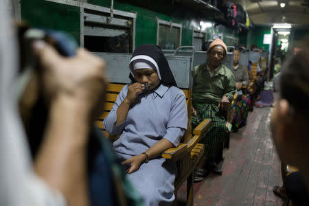 Catholics from Kachin state travel during a two-day train trip from Myitkyina to Yangon to attend Pope Francis' visit to Myanmar next week, November 23, 2017. REUTERS/Ann Wang