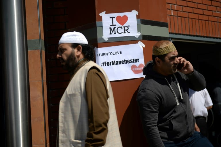 Worshippers leave Friday Prayers at Manchester Central Mosque on May 26, 2017 where "I Love MCR" signs adorned the walls