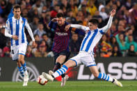 Soccer Football - La Liga Santander - FC Barcelona v Real Sociedad - Camp Nou, Barcelona, Spain - April 20, 2019 Barcelona's Lionel Messi in action with Real Sociedad's Igor Zubeldia REUTERS/Albert Gea