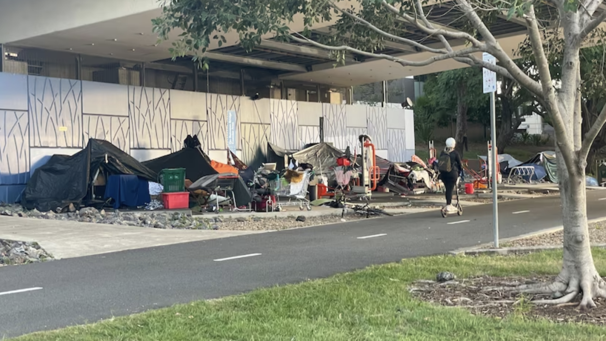 Tents for the homeless seen along a walkway in Brisbane. 