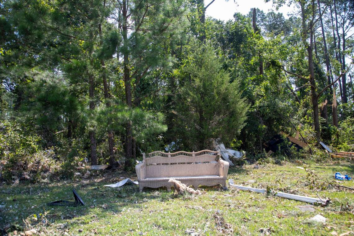 Lawn furniture and debris sits about 50 yards from the nearest home on Great Glen in the Belmont Lakes Country Club community in Rocky Mount Thursday, July 20, 2023. An EF3, tornado with wind speeds of 150 mph touched down in Nash County Wednesday around 12:30 p.m. Wednesday according to the Raleigh National Weather Service.. Travis Long/tlong@newsobserver.com