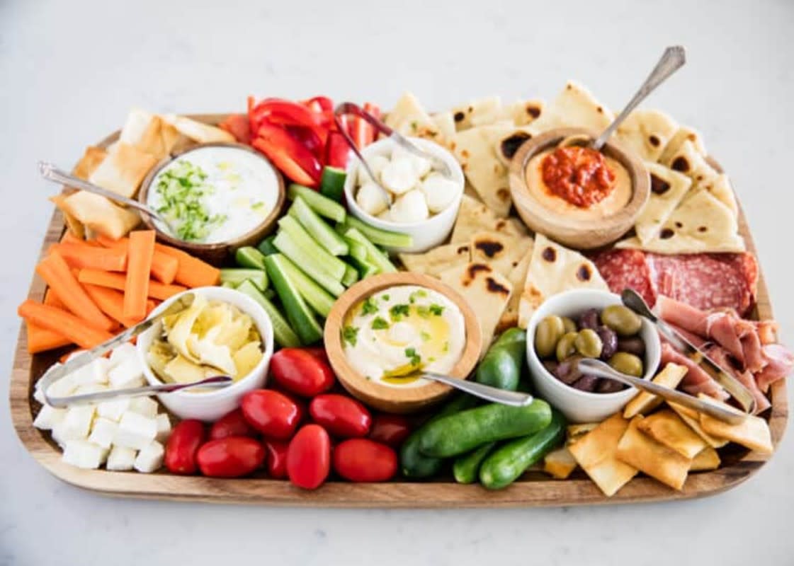 <p>I Heart Naptime</p><p>This is the perfect appetizer for entertaining and includes all of your Mediterranean favorites! </p><p><strong>Get the recipe: </strong><strong><a href="https://www.iheartnaptime.net/mezze/" rel="nofollow noopener" target="_blank" data-ylk="slk:Mezze Platter;elm:context_link;itc:0;sec:content-canvas" class="link rapid-noclick-resp">Mezze Platter</a></strong></p>