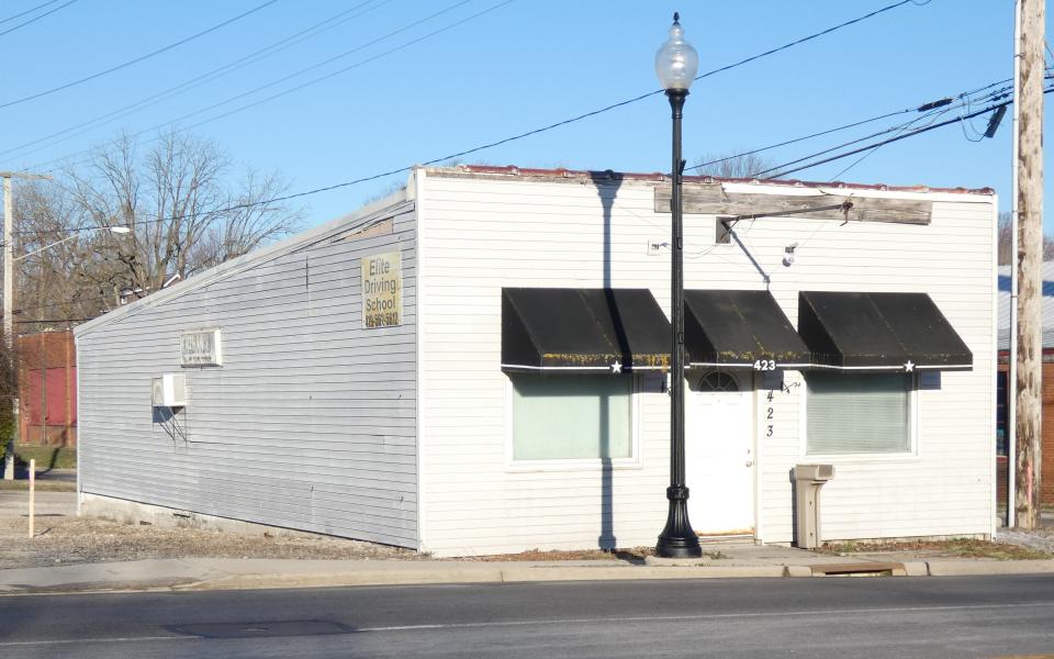 A building at 423 N. Sandusky Ave. that has housed Elite Driving School and H&R Block will be demolished this spring as part of the Norton Bicentennial Park project. The site will be used for parking, planners said.