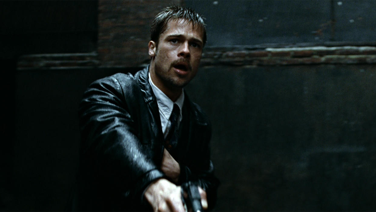  Brad Pitt in the rain with a gun in Se7en. 