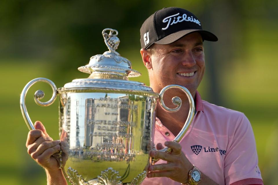 Justin Thomas poses with the Wanamaker Trophy after winning the US PGA Championship (Matt York/AP) (AP)