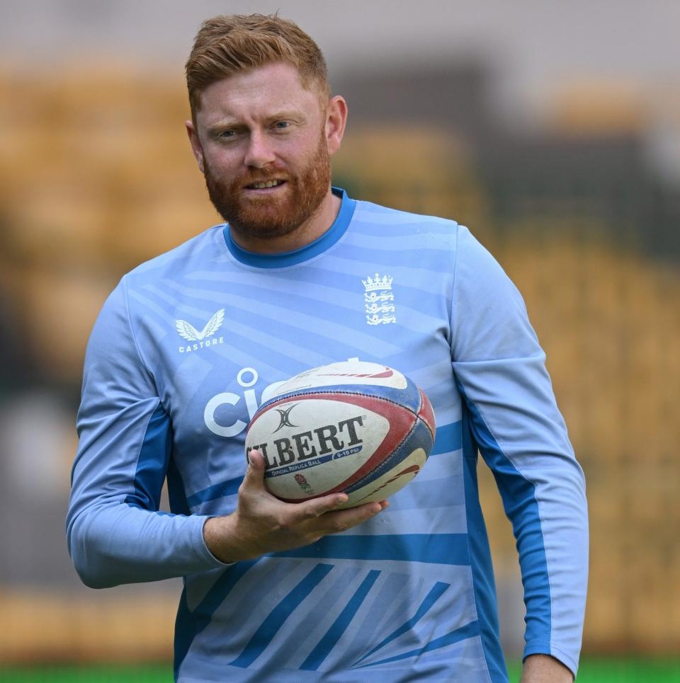 OCTOBER 25: Jonny Bairstow of England holds a rugby ball during the ICC Men's Cricket World Cup India 2023 England & Sri Lanka Net Sessions at Karnataka State Cricket Association Stadium on October 25, 2023 in Bangalore