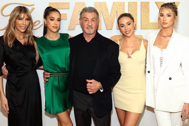 <p>Dimitrios Kambouris/Getty</p> Sylvester Stallone and Jennifer Flavin (far left) with daughters (from left) Sistine, Sophia and Scarlet