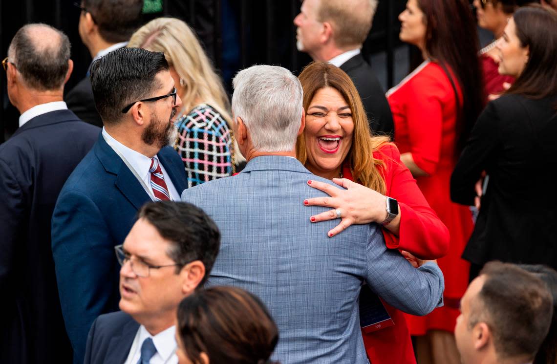 Miami Dade College President Madeline Pumariega, right, and Florida Education Commissioner Manny Diaz Jr., left, arrive before the start of Florida Gov. Ron DeSantis’ inauguration ceremony on Tuesday, Jan. 3, 2023, in Tallahassee, Fla.