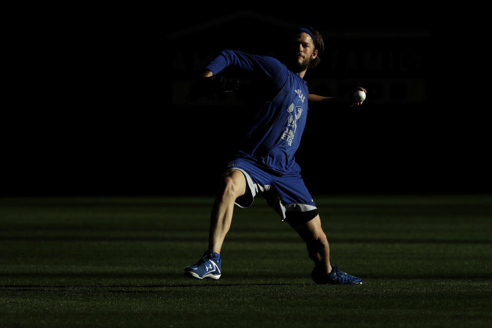 Los Angeles Dodgers' Clayton Kershaw warms up during batting practice Game 7 of the National League Championship Series baseball game against the Milwaukee Brewers Saturday, Oct. 20, 2018, in Milwaukee. (AP Photo/Matt Slocum)