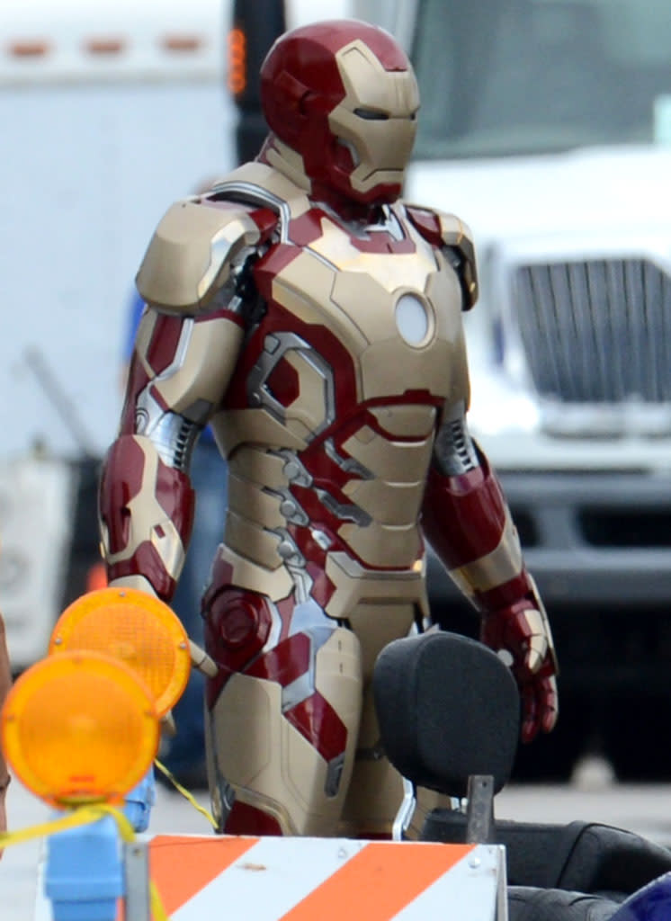 <b>Golden Touch</b><br> Tony Stark has a new suit, and it is blinged out. This shot of Robert Downey Jr.'s updated armor in "Iron Man 3" was spotted on location in Dania Beach, Florida where the sequel is currently filming. The suit looks markedly different than the one last seen in "The Avengers," with more of the armor painted gold than before. It also has a less shiny finish than the versions in the previous two "Iron Man" films.