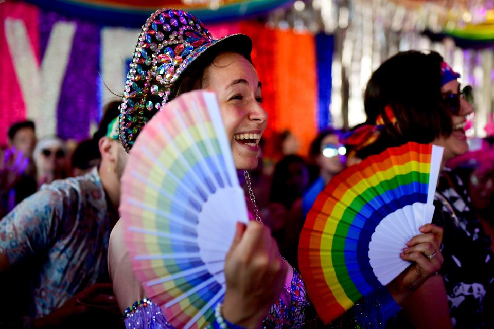 Bonnaroo attendees participate in a Pride event during the festival on Saturday, June 18, 2022 in Manchester, Tennessee.