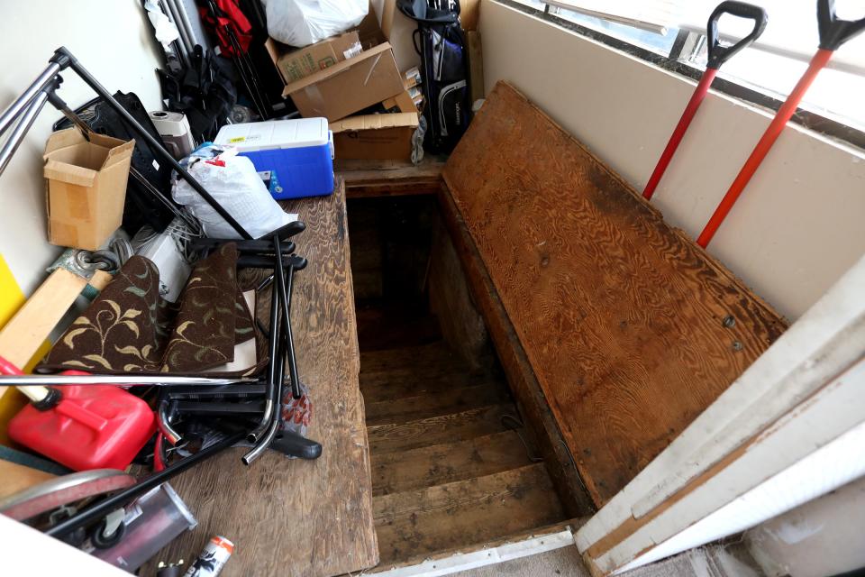 The steps that lead to the basement where Adam Fox, a suspect in the alleged kidnapping plot on Governor Gretchen Whitmer of Michigan was allowed to live temporarily.
Briant Titus, 60 of Grand Rapids on Oct. 9, 2020, showed off this inside part of Vac Shack, the vacuum sales and repair shop he's owned for ten years.  Titus had known Fox since Fox was a kid and said he was just trying to do the right thing to help Fox out.