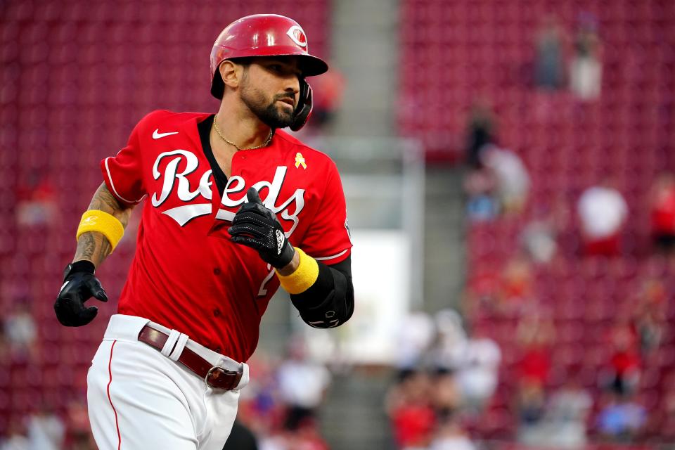 Cincinnati Reds right fielder Nick Castellanos (2) rounds the bases after hitting a grand slam home run in the second inning of a baseball game against the St. Louis Cardinals, Wednesday, Sept. 1, 2021, at Great American Ball Park in Cincinnati. 