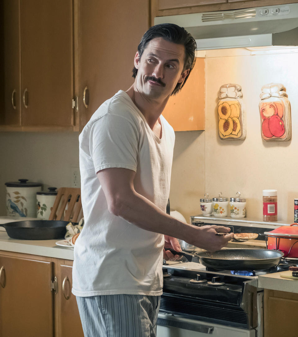 This image released by NBC shows Milo Ventimiglia as Jack in a scene from "This Is Us." The time-shifting series revealed in season one that Jack Pearson was destined to die young. In episodes airing in January and February, we learned it was a faulty slow-cooker and Jack's boundless sense of duty. America's tears flowed even as we turned a fearful eye toward our kitchen appliances. (Ron Batzdorff/NBC via AP)