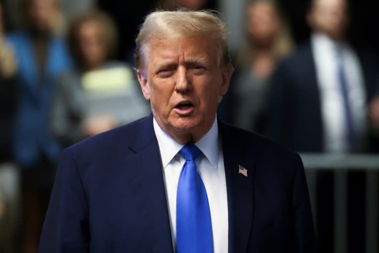 Former US president and Republican presidential candidate Donald Trump speaks to the press at Manhattan Criminal Court during a break in his trial over allegedly covering up hush money payments (Yuki Iwamura)