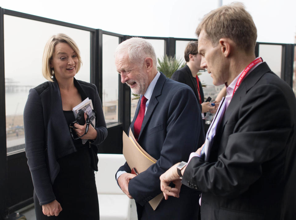 Labour Party leader Jeremy Corbyn (centre) talks with BBC political editor Laura Kuenssberg, whilst watched by advisor Seamus Milne, after an interview at the Labour Party annual conference, at the Brighton Centre, Brighton.