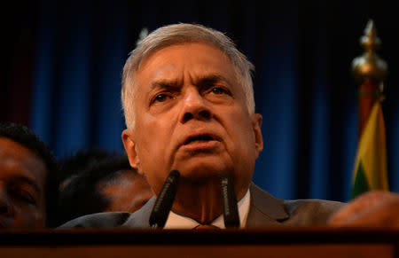 Sri Lanka's Prime Minister Ranil Wickremesinghe addresses his supporters and the party members after assuming duties in Colombo, Sri Lanka December 16, 2018. REUTERS/Stringer