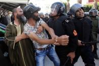 Riot police charge against protesters during a demonstration against official abuses and corruption in the town of Al-Hoceima, Morocco July 20, 2017. REUTERS/Youssef Boudlal