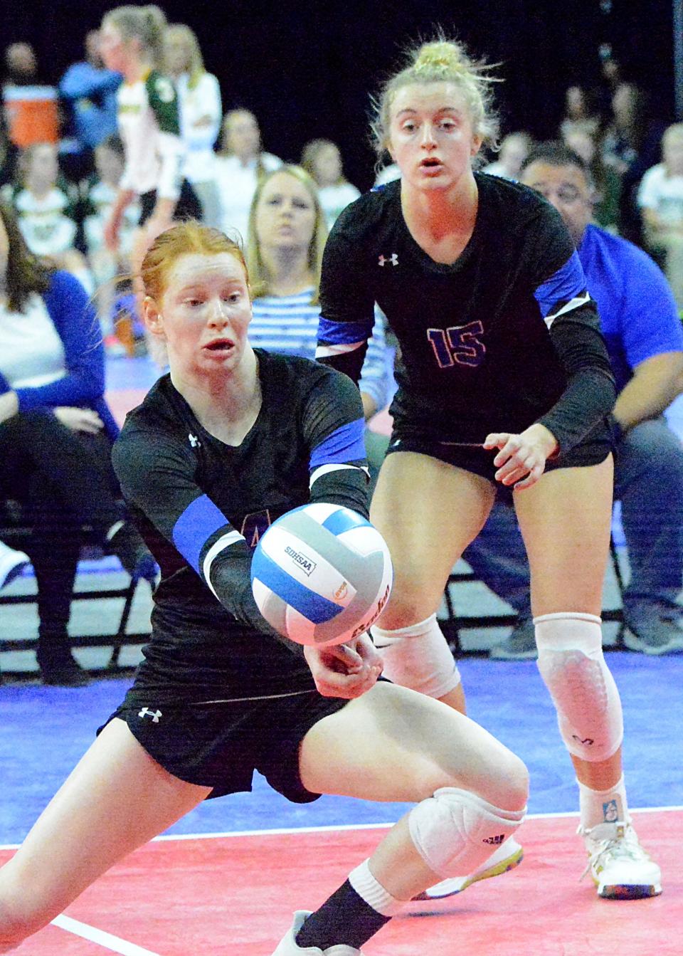 Sioux Falls Christian's Addisen Barber keeps the ball alive in front of teammate Brietta Tims during their first-round Class A match against Dakota Valley in the state high school volleyball tournament on Thursday, Nov. 17, 2022 in the Denny Sanford PREMIER Center.