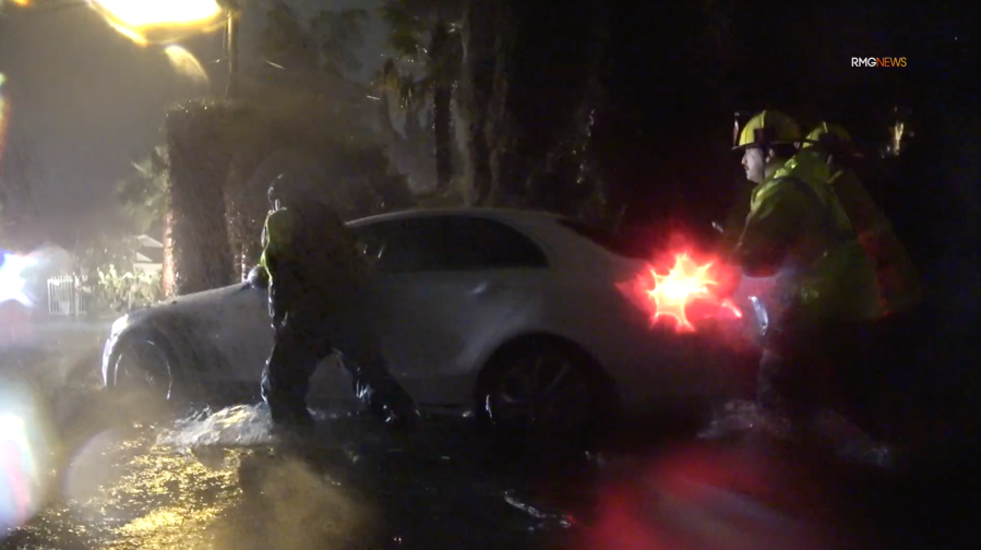 Motorists stranded in flood waters in Tarzana