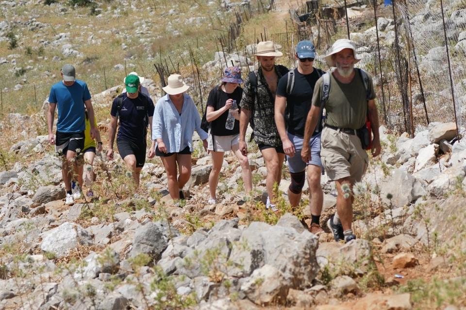 A team of seven volunteers search in exhausting heat for Dr Michael Mosley (Yui Mok/PA Wire)