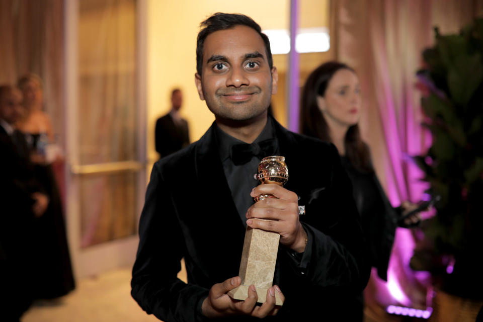 Aziz Ansari, posing with a Golden Globe he won on Jan. 7, said he believed the sexual encounter last year with a woman now accusing him of assault was "completely consensual." (Photo: Greg Doherty via Getty Images)