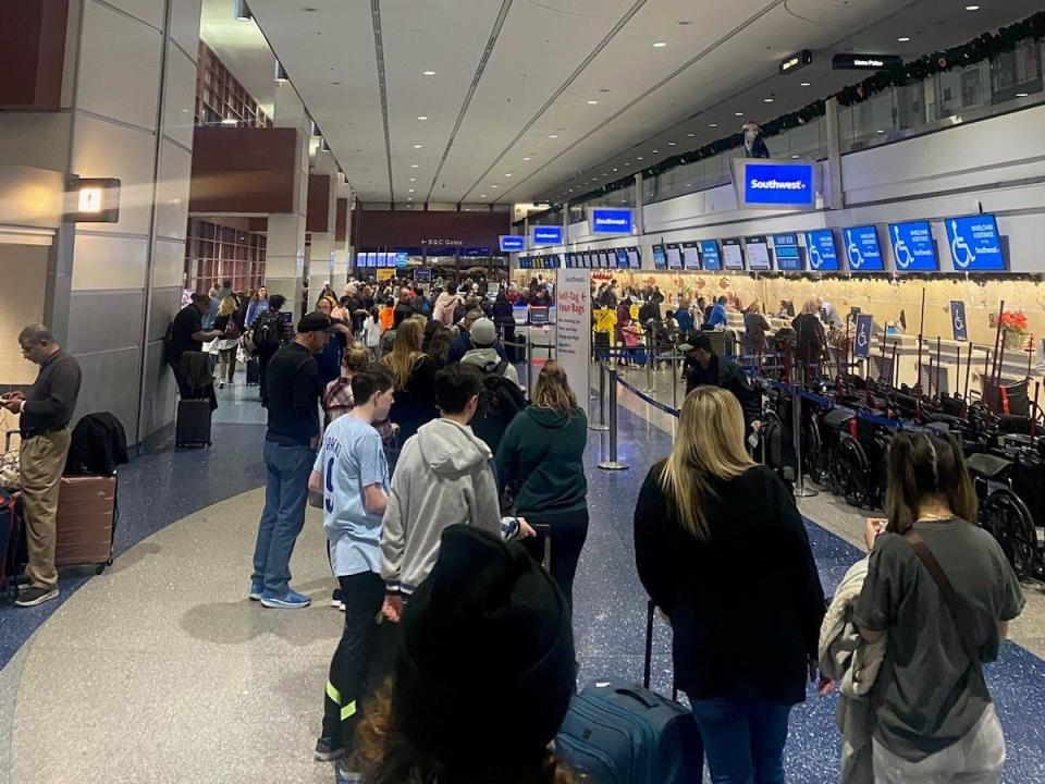 The Betheas said the line to talk to a Southwest agent spanned the length of the terminal.