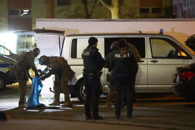 German special forces prepare to search an area after a shooting in Hanau near Frankfurt