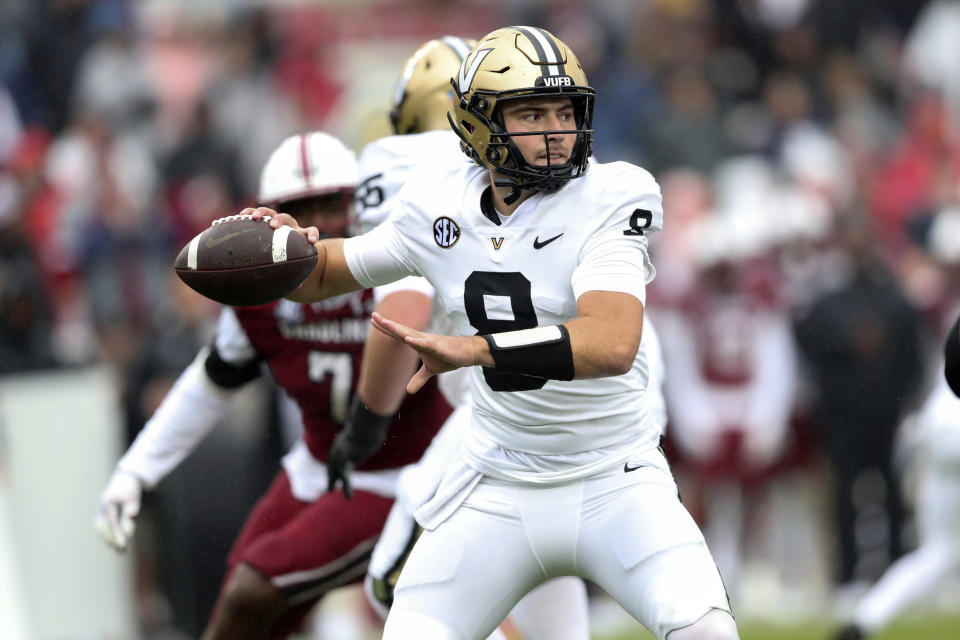Vanderbilt quarterback Ken Seals (8) drops back to pass during the first half of an NCAA college football game against South Carolina on Saturday, Nov. 11, 2023, in Columbia, S.C. (AP Photo/Artie Walker Jr.)
