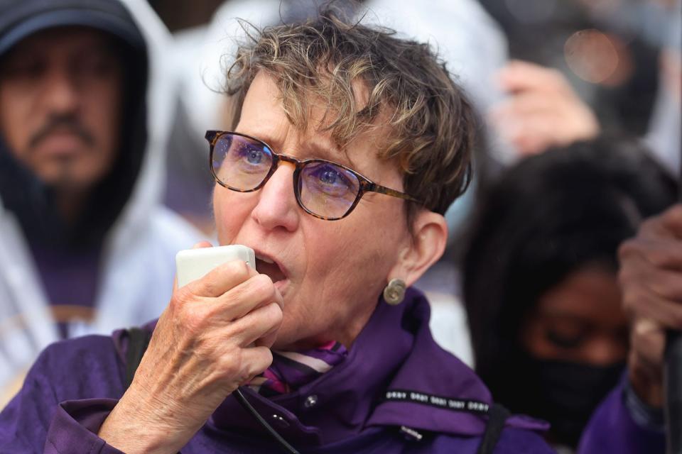 Mary Kay Henry speaks to workers at a rally outside of the Willis Tower headquarters of United Airlines in March 2022 in Chicago.