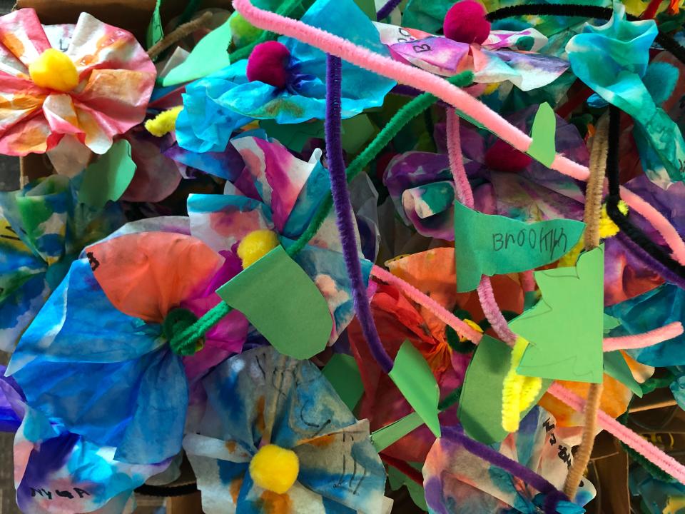 A box of flowers, created by Burris Laboratory School students, ready to be used as centerpieces for this year's Bridge Dinner event.