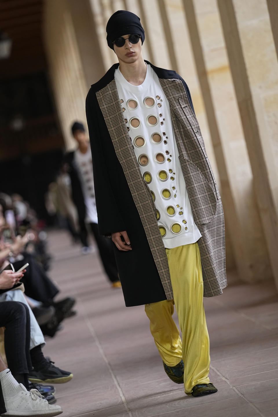 A model wears a creation for Givenchy Menswear Spring/Summer 2024 fashion collection presented in Paris, Thursday, June 22, 2023. (AP Photo/Michel Euler)