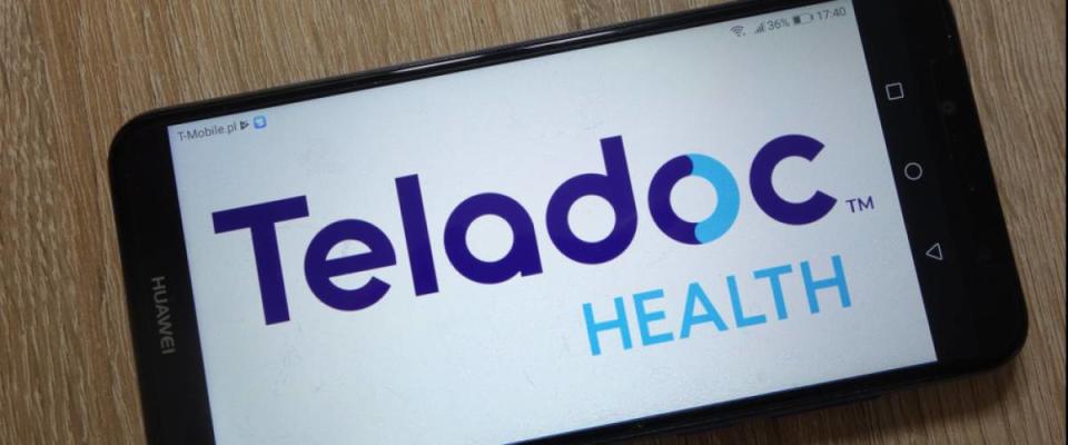 Teladoc Health logo displayed on smartphone