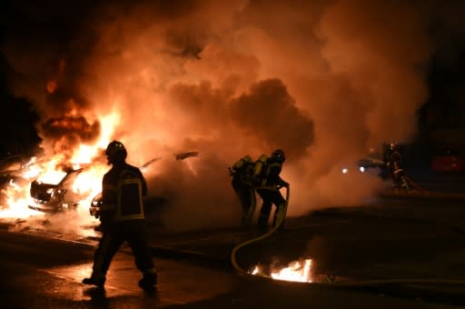 Dozens of vehicles were set ablaze in a fourth night of rioting in western France after a policeman shot dead a young black man
