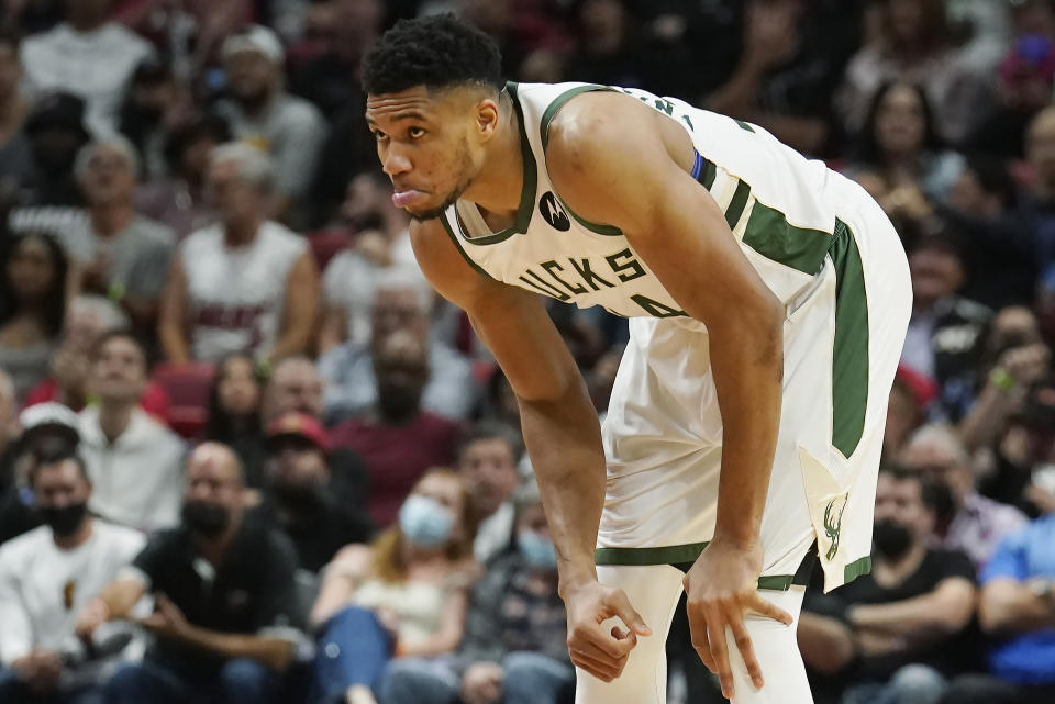 Milwaukee Bucks forward Giannis Antetokounmpo (34) reacts as his team fall behind during the second half of an NBA basketball game against the Miami Heat, Wednesday, Dec. 8, 2021, in Miami. The Heat defeated the Bucks 113-104. (AP Photo/Marta Lavandier)