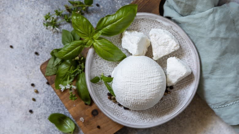 Fresh ricotta cheese with basil