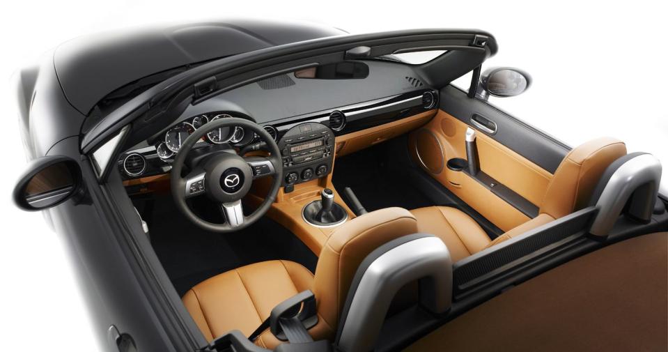 <p>Styling cues, such as the shapes of the headlights and taillights, the little bulge in the center of the hood, and the windshield surround, draw clear inspiration from the original Miata, helping to keep the car familiar. Inside, the MX-5 takes a big leap forward with a slightly roomier cabin with upscale aspirations.<br></p>