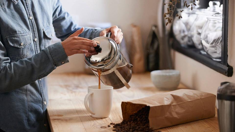 man making coffee at home