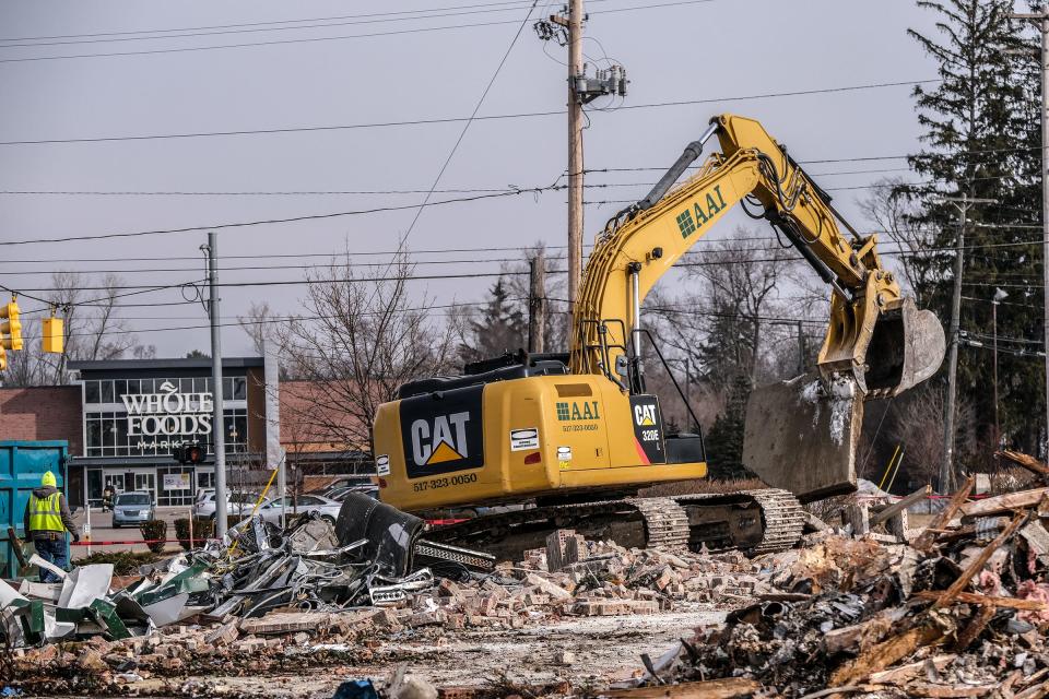 The former Golden Wok restaurant is demolished in Okemos on March 9, 2022.