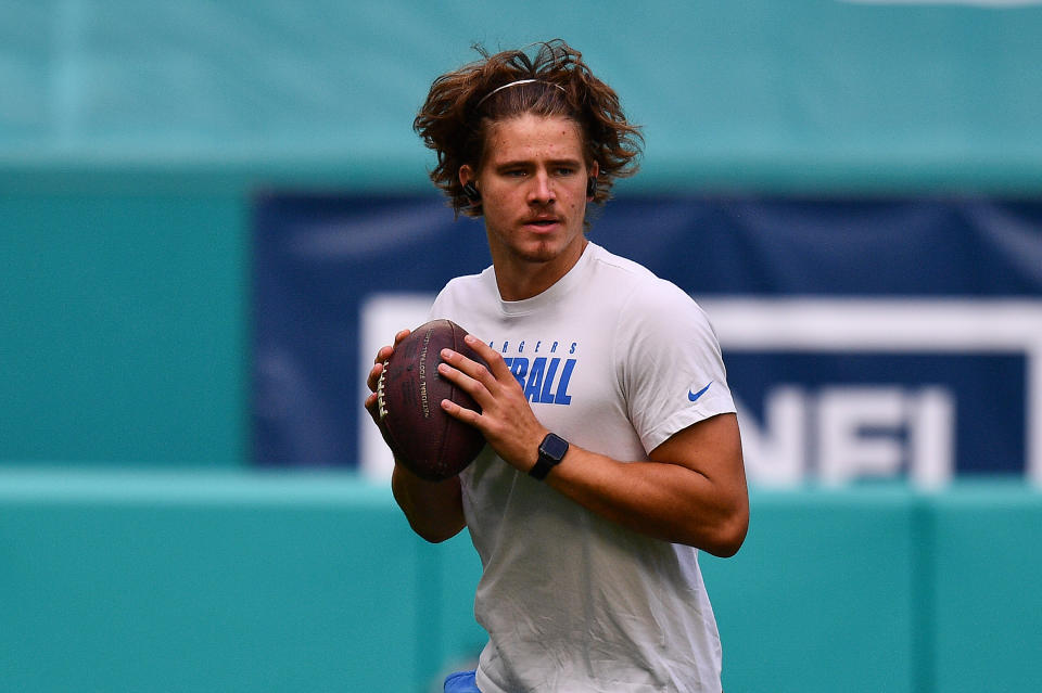 MIAMI GARDENS, FLORIDA - NOVEMBER 15:  Justin Herbert #10 of the Los Angeles Chargers warms up prior to the game against the Miami Dolphins at Hard Rock Stadium on November 15, 2020 in Miami Gardens, Florida.  (Photo by Mark Brown/Getty Images)