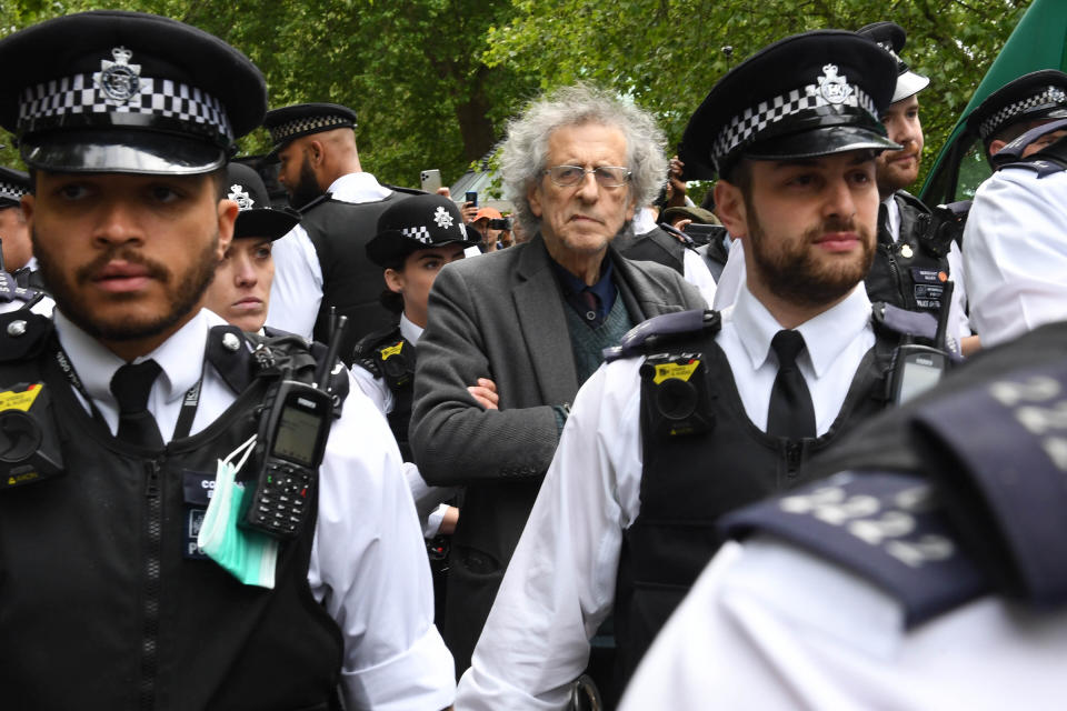 Police lead away Piers Corbyn, brother of former Labour leader Jeremy Corbyn, as protesters gather in breach of lockdown rules in Hyde Park in London after the introduction of measures to bring the country out of lockdown. (Photo by Stefan Rousseau/PA Images via Getty Images)