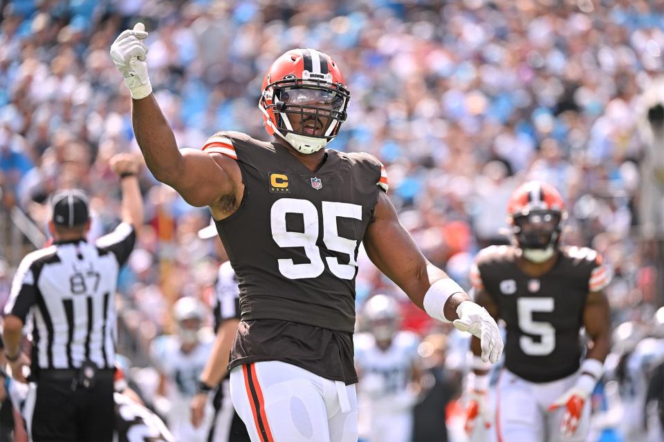 CHARLOTTE, NORTH CAROLINA - SEPTEMBER 11: Myles Garrett #95 of the Cleveland Browns reacts after a sack of Baker Mayfield #6 of the Carolina Panthers during their game at Bank of America Stadium on September 11, 2022 in Charlotte, North Carolina. Cleveland won 26-24. (Photo by Grant Halverson/Getty Images)