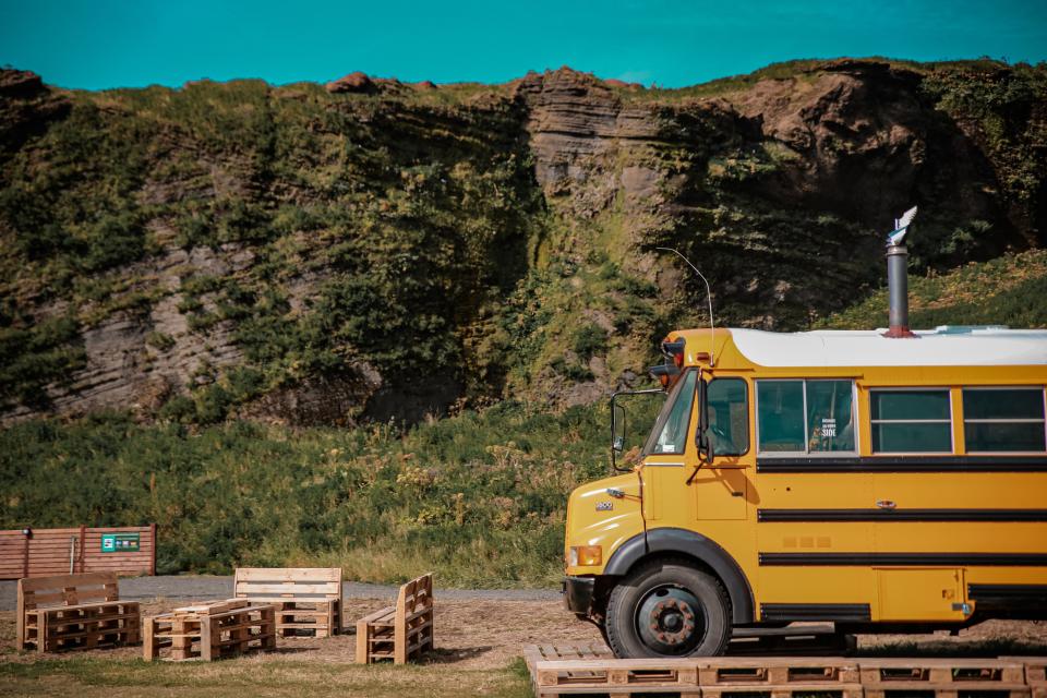 Skool Beans's school bus coffee shop setting offers visitors to Reynisfjara black sand beach a welcome respite from the wind.