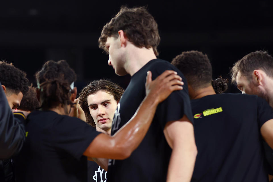 MELBOURNE, AUSTRALIA – AUGUST 16: Josh Giddey of Australia looks on during a team huddle during the match between the Australia Boomers and Brazil at Rod Laver Arena on August 16, 2023 in Melbourne, Australia. (Photo by Graham Denholm/Getty Images)