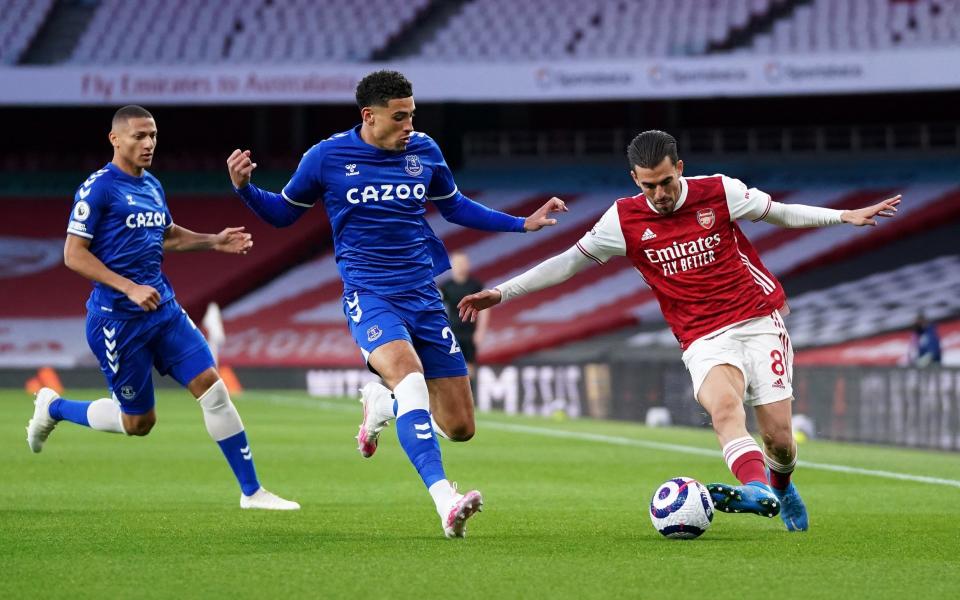 Dani Ceballos of Arsenal battles for possession with Ben Godfrey - Getty Images